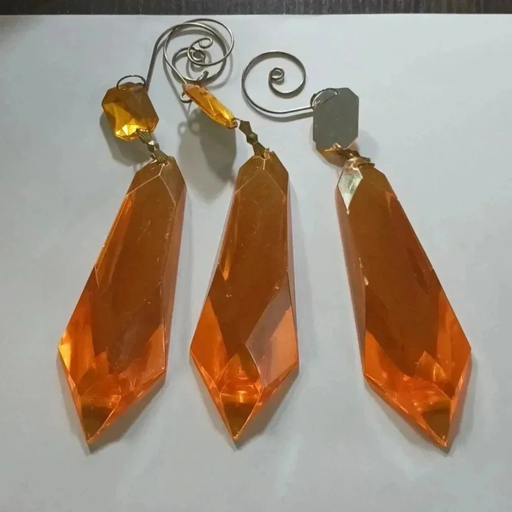 Three orange chimes..stainless steel..never used!